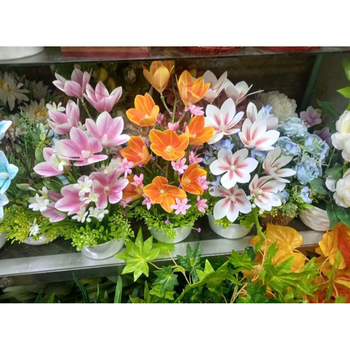 0759334_atrificial-flower-in-unique-orchid-with-ceramic-top