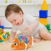 0530358_mechanical-gear-multicolor-fish-toy-baby-lights-music