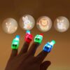 1309301_5pcs-cartoon-cute-projection-led-finger-light-toys-multi-pattern-light-emitting-ring-finger-light-to